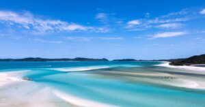 Experience the breathtaking turquoise waters and white sands of the Whitsundays, Australia.